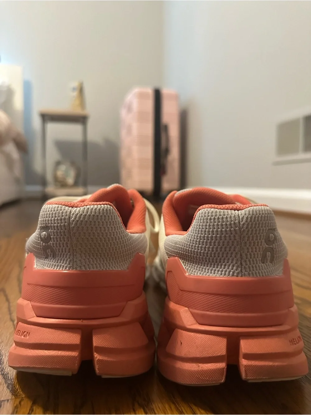On Running Women’s White and Coral Lace-Up Sneakers